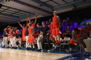 The Syracuse bench goes ballistic during the Orange's 79-76 win over No. 18 UConn in Atlantis on Thursday. 