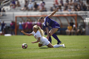 Eva Gourdeau falls flat in a game against Albany earlier this week. Syracuse's best start since 2003 came to an end with the loss.