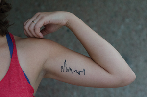 Senior Madeline Brooks got the tattoo of the Chicago skyline on her inner forearm to remind herself of her childhood.