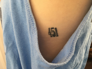 Sarah Utz got a matching tattoo with her friend of the number 451 to commemorate a favorite book they read together, 